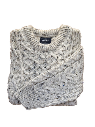 Der Wollpullover gelegt.