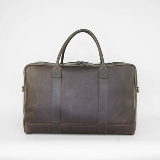 Braune Harris Tweed® Reisetasche mit verstellbarem Schultergurt.